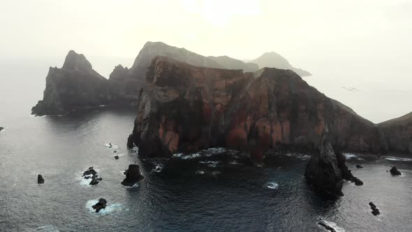 Flying Over the Rugged Coastline at Easternmost Point of Madeira Island, Portugal alt
