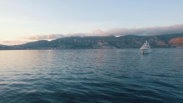 South of France sea view with large private luxury yacht and chase boat underway. Super yacht
