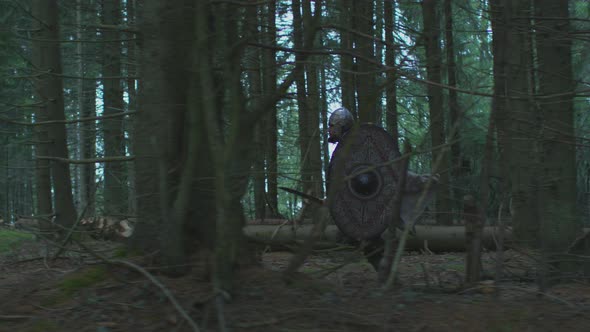 Soldier running in the woods alt