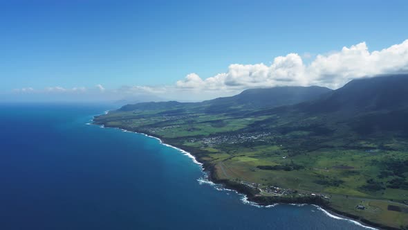 Drone view of sea island and Mount Liamiuga covered with mountain forests in Saint Kitts and Nevis alt
