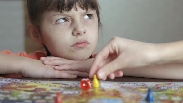 Happiness with board game.  alt