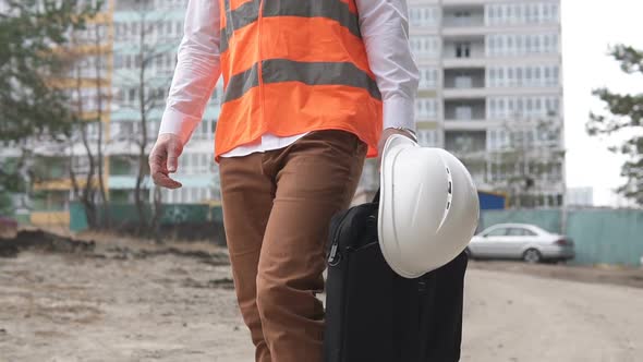 Construction Engineer is Going Home From Work alt