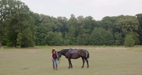 Woman Riding Horse on Farm, Recreation  Woman Walking with Horse alt