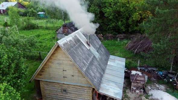 Smoke Comes From the Chimney Stove Heating Woodfired Sauna