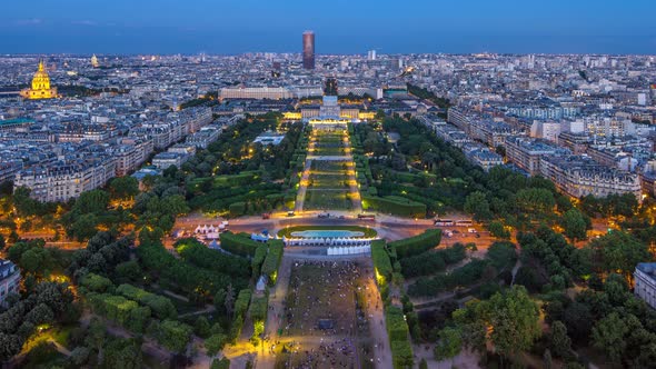 Aerial View of a Large City Skyline After Sunset Day to Night Timelapse alt