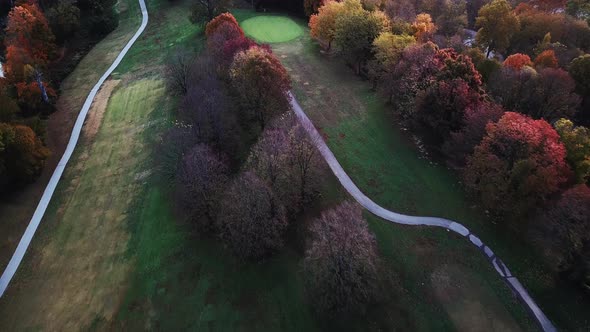 4k Aerial View of Drone Flying above the stunning colorful treetops in Louisville on Autumn Morning