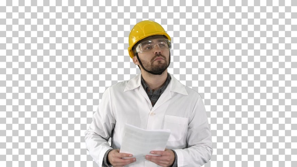 Site engineer cheching papers and something, Alpha Channel alt