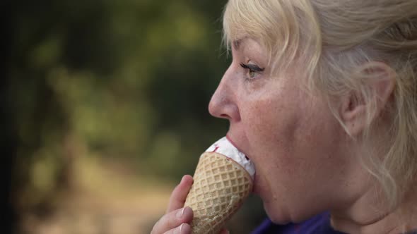 Woman Eating Icecream at the Street alt
