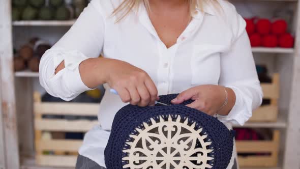 Woman Weaving Handmade Crochet Bag in Arts and Crafts Workshop