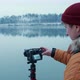 Hiker Taking Pictures of Snowy Nature in Winter Lake Background Winter Forest - VideoHive Item for Sale