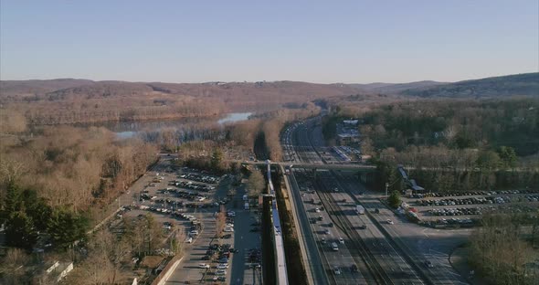 An aerial shot zooming out from the Goldens Bridge Train Station alt