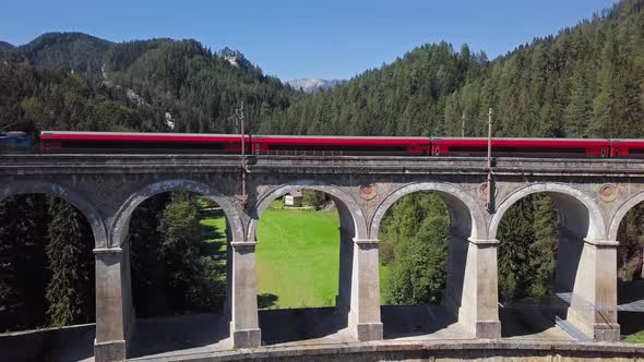 Aerial of Train on Viaduct in Semmering Railway, Austria alt