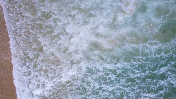Top view tropical beach Amazing waves sea background. Crashing waves on beach sand, Beautiful sea alt