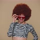 Happy Young Woman with Brown Lush Wig Listening Music and Dancing Disco Fooling Around Having Fun - VideoHive Item for Sale