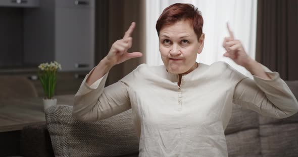 Annoyed Female Blocking Loud Noises alt