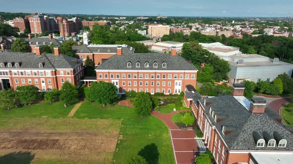 Brick buildings on campus of Johns Hopkins University grounds. Aerial approach. alt