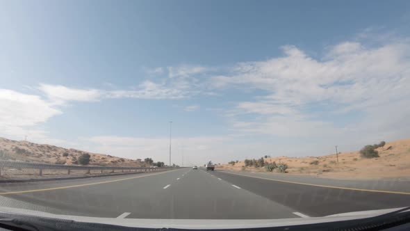 Middle Eastern Road Trip Firstperson View in a Moving Car on a Deserted Road View From the Car alt