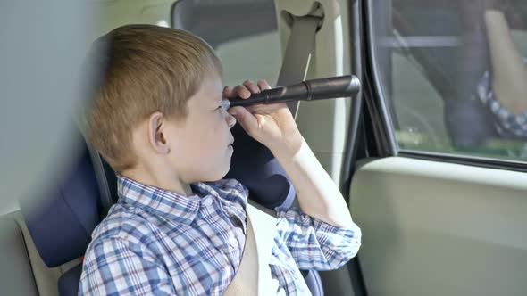 Kid Looking at Road with Spyglass alt