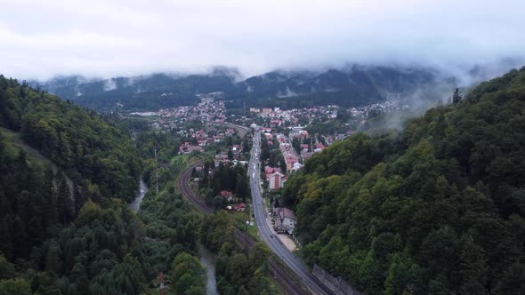 Beautiful Drone Foggy Footage of a Small Village in Romania in the Morning