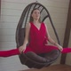 Cute Sporty Fit Woman Doing Splits in Swing Chair - VideoHive Item for Sale