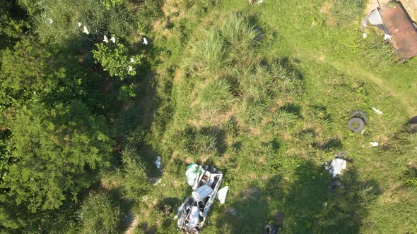 Airsoft Shooting Range Battle Grounds Green Forest Sunny Day Birds Flying Circular Motion Aerial Dro alt