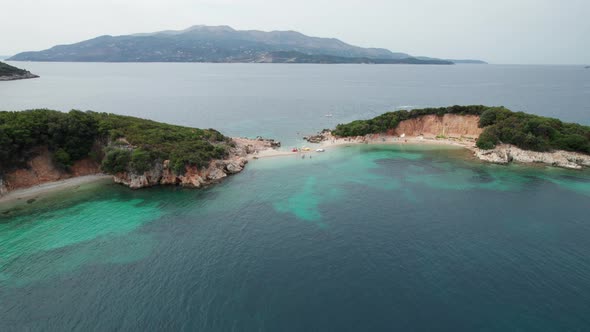 Aerial View of Tropical Beach in Ksamil Islands with Turquoise Water Albania alt