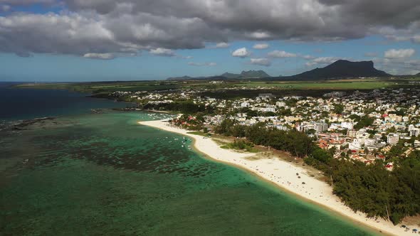 Bird's Eye View of a Suburb with a Beautiful White Beach on the Island of Mauritius