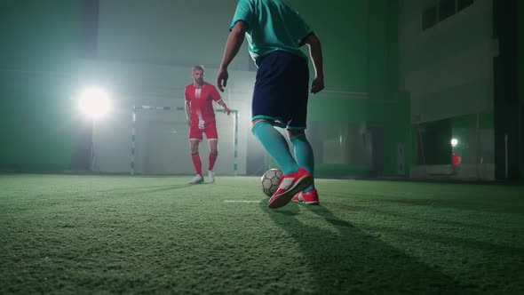 Slow Motion Training Day on the Football Club Young Guys Play Football Indoor Stadium Man Bypass the alt