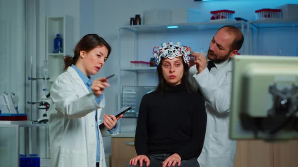 Professional Neurological Researcher Explaning Treatment Result alt