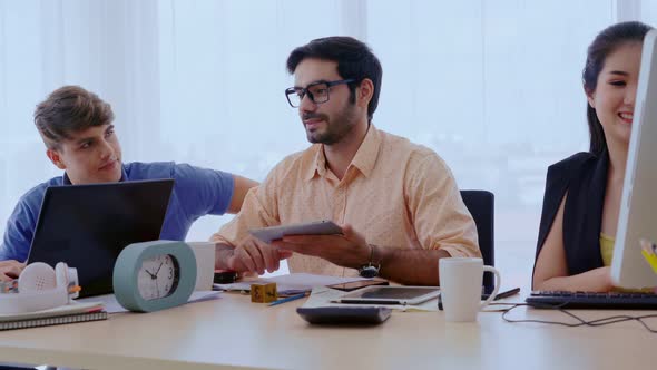 Group Meeting of Creative Business People Designer and Artist at Office Desk alt