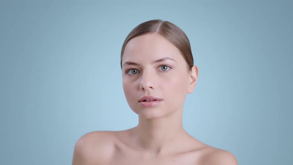 Portrait of Seductive Young Woman Turning and Looking to Camera  alt