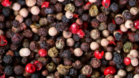 Super Slow Motion Shot of Moving Color Pepper Background at 1000Fps alt