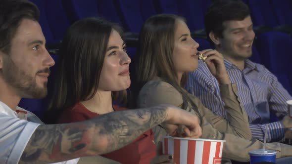 Two Couples Spend a Double Date at the Cinema and Watch the Movie