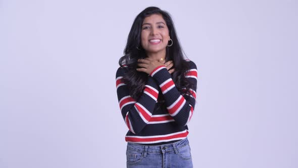 Happy Young Beautiful Persian Woman Looking Excited While Talking alt