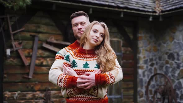 Lovely girl and a guy outdoors. alt