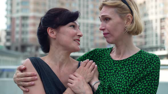 Portrait of Stressed Adult Woman Smiling As Friend Calming Down Worried Lady alt