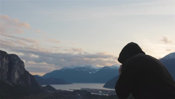 Caucasian Man Wearing a Black Hoodie Practicing Shadow Boxing alt