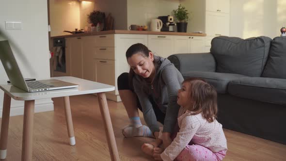 Online Fitness Lesson for Mother and Child. Sports Activity at Home with Children. Quarantine Covid alt
