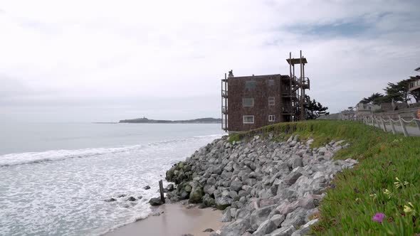 Panoramic view of the Pillar Point and an old hotel by the bay alt