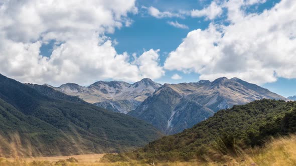 Clouds over Alpine Mountains Landscape in Wild Nature of New Zealand alt