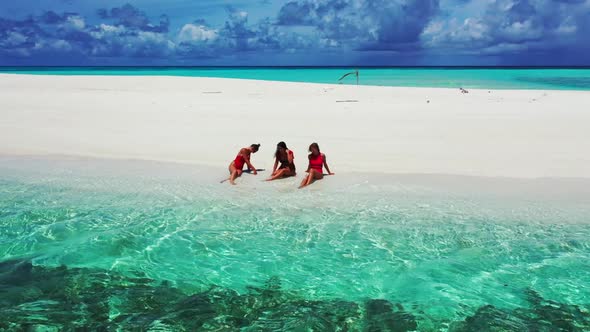 Girls look beautiful on paradise sea view beach holiday by blue green lagoon with white sandy backgr alt