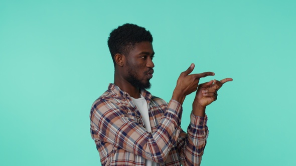 African American Man Pointing Around with Finger Gun Pistol Gesture Making Choice Shooting Killing alt