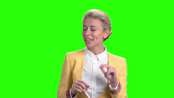 Woman Passionately Singing on Green Screen alt