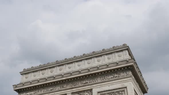 Highly detailed surface of Arch of Triumph in Paris France in front of cloudy sky 4K 3840X2160 30fps alt