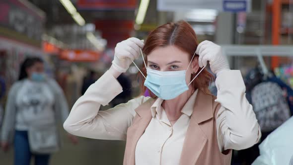 Shopping on Coronavirus, Woman Buyer Wearing a Mask and Gloves While Shopping in Quarantine Because alt