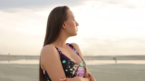 Sensual Woman in Black Bikini Standing and Enjoying Sunshine