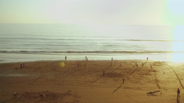 Silhouette of People on the Beach of Atlantic Ocean Slow Motion People Playing Football on Beach at alt