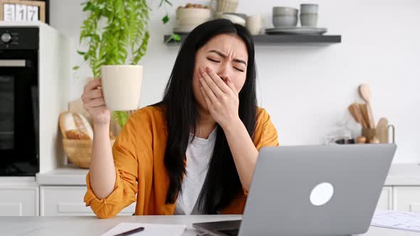 Bored Chinese Girl Freelancer Designer Working Remotely From Home Tired of Boring Online Work alt