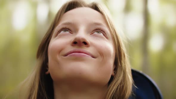 Happy Young Caucasian Woman, Tourists Enjoying Fresh Air and Sun Rays in the Park alt