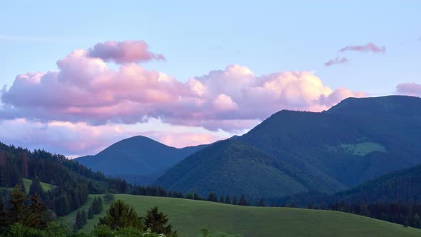 Hills and Forests with Moving Clouds Over the Carpathians in Summer Time Lapse at Sunset